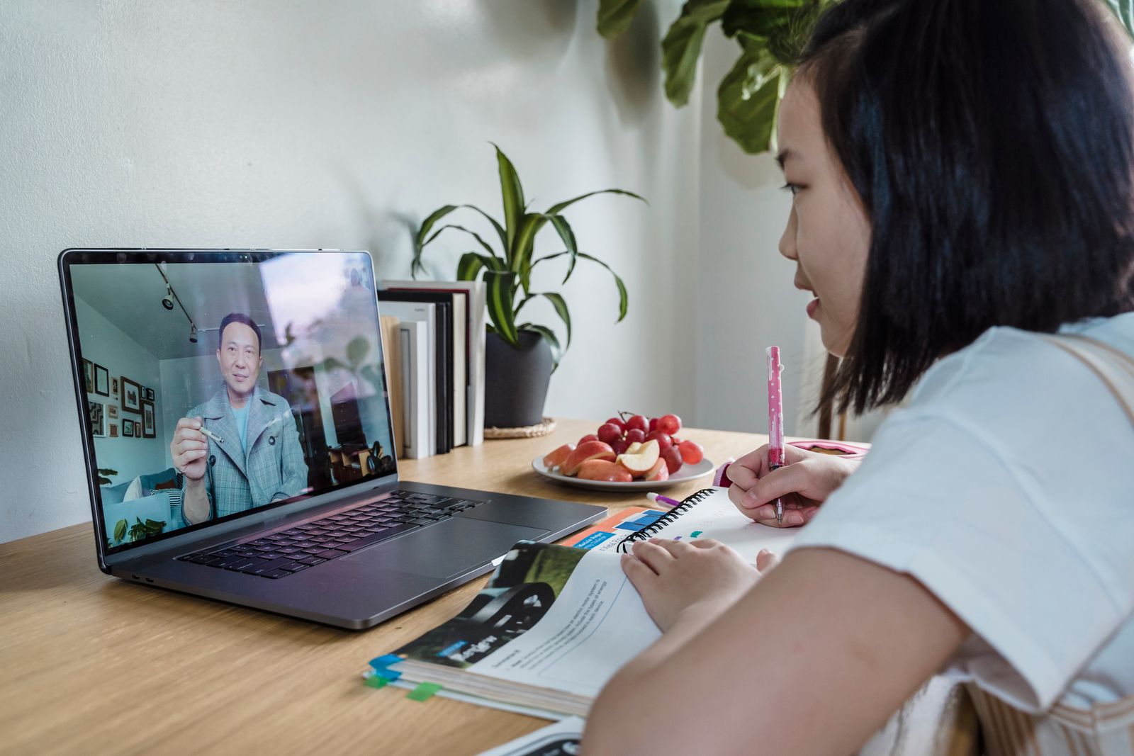Student joining an English lesson by video call on a laptop